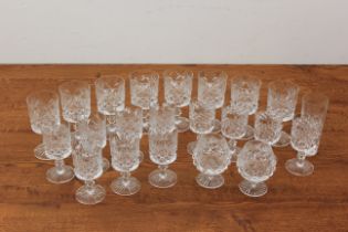 A part-suite of cut-glass drinking glasses - 1970s-80s; with diamond, blaze and triangular cut