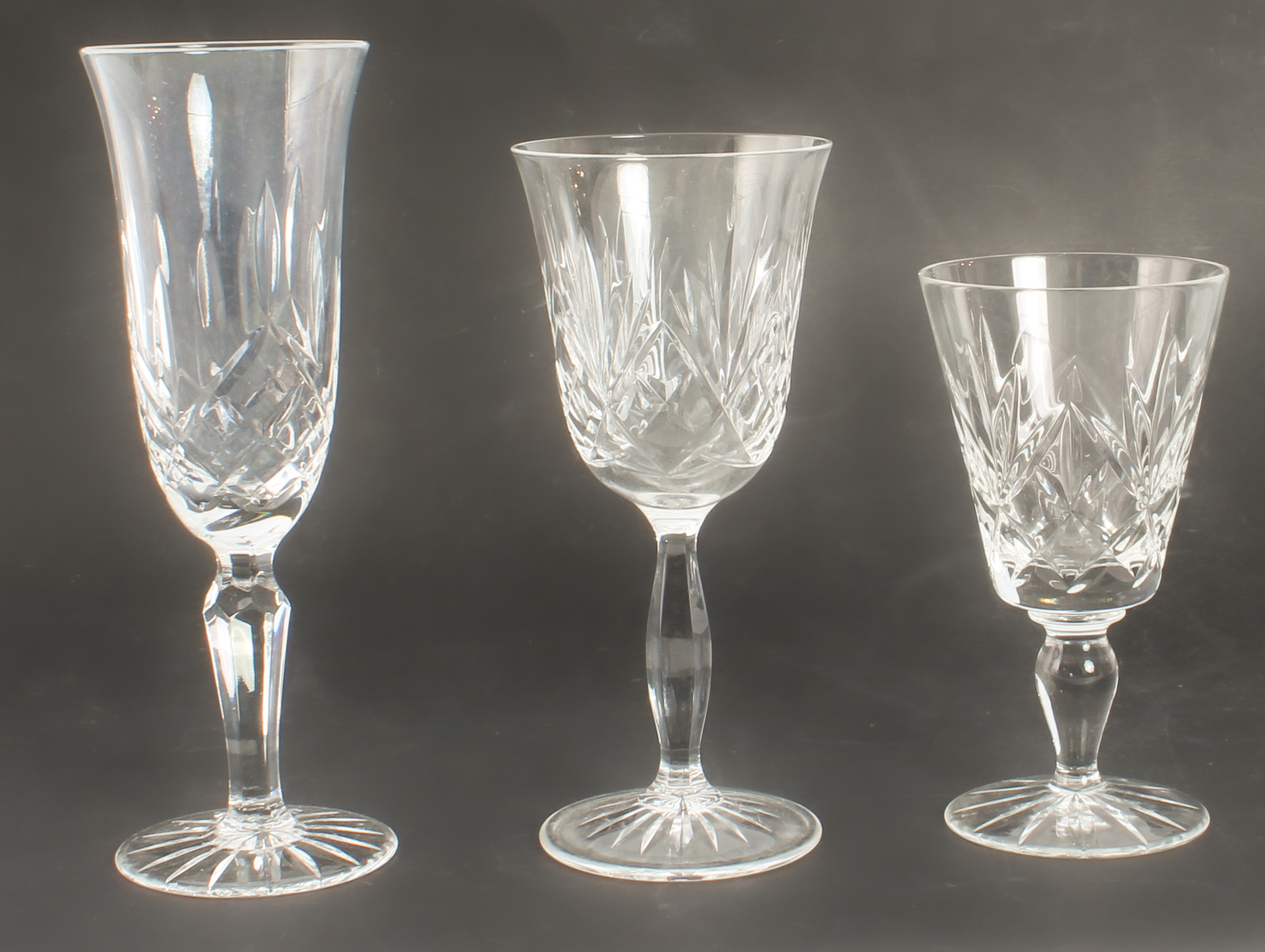 A part-set of cut-glass wine glasses with sunburst bases: 6 x 16.5 cm wines  6 x 13.5 cm wines 4 x - Image 3 of 4