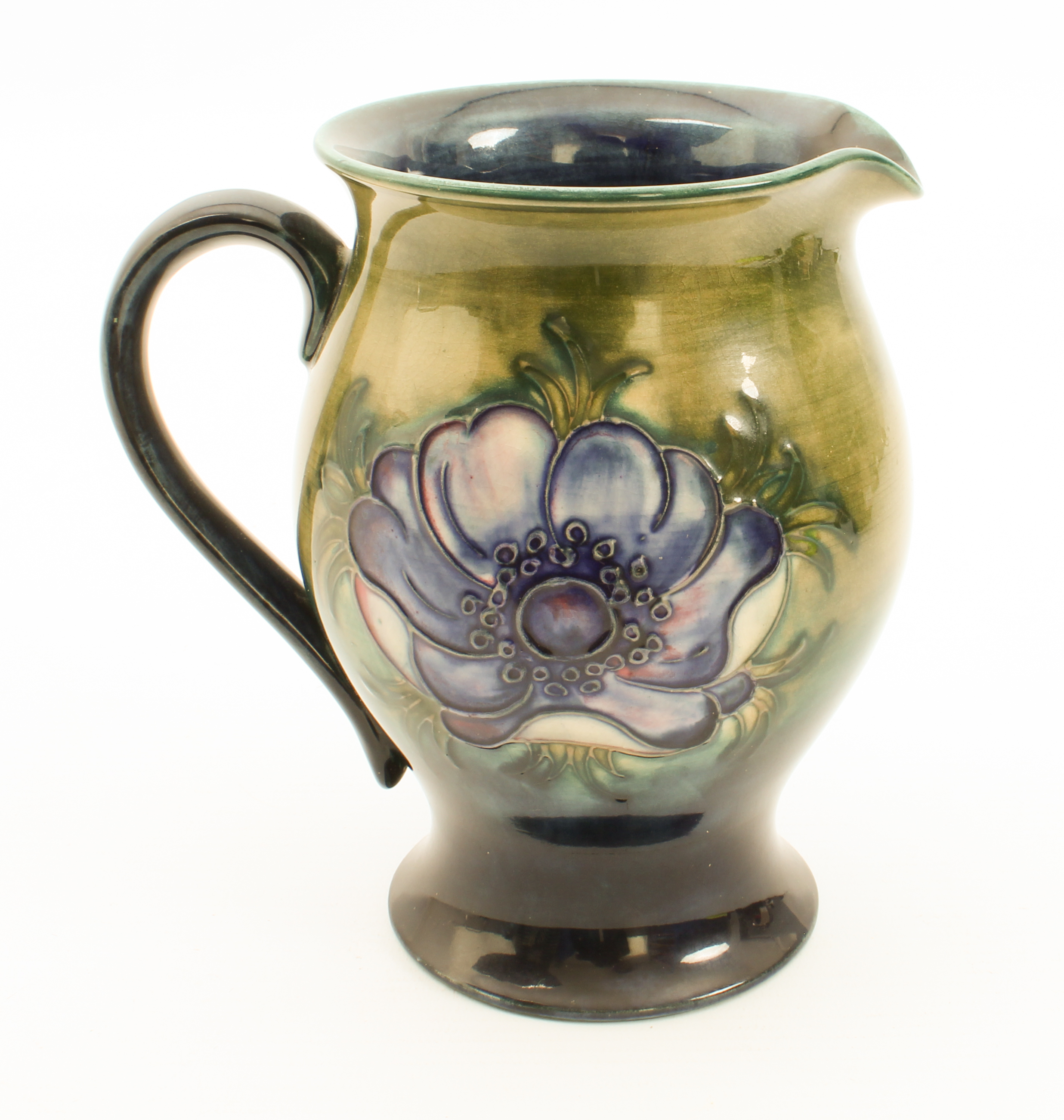 A Moorcroft jug in the 'Anemone' pattern - impressed factory mark with facsimile signature, also - Image 2 of 4