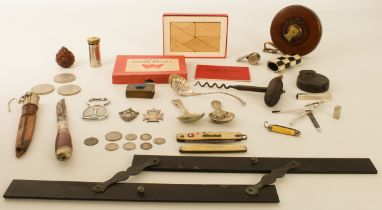 A small box of collectables - including a 19th century corkscrew; two Victorian silver prize medals;