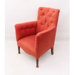 A 19th century style button-back armchair - modern, upholstered in coral pink and raised on