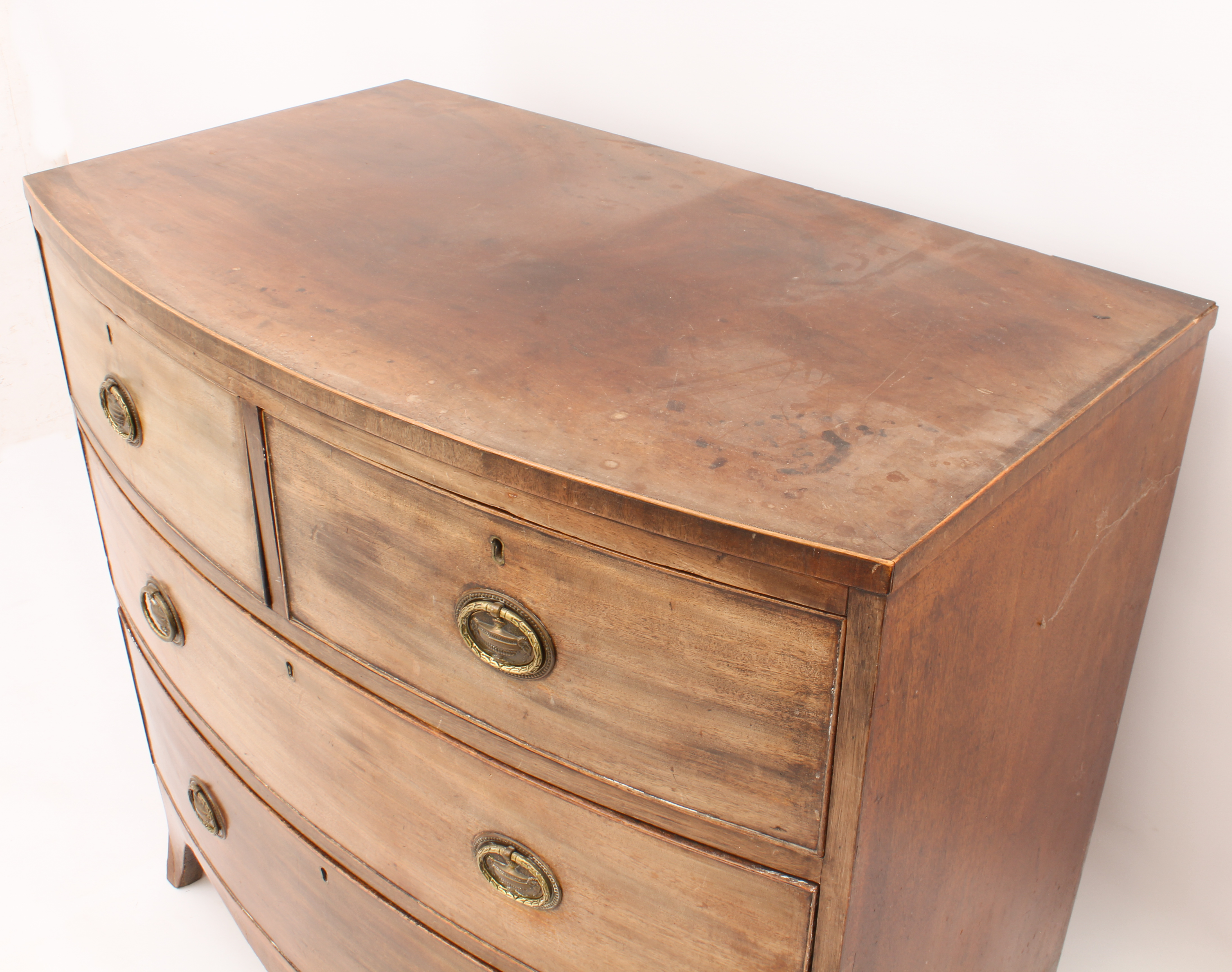 A Regency mahogany bowfronted chest of drawers - the boxwood-strung top over two short and two - Image 3 of 3