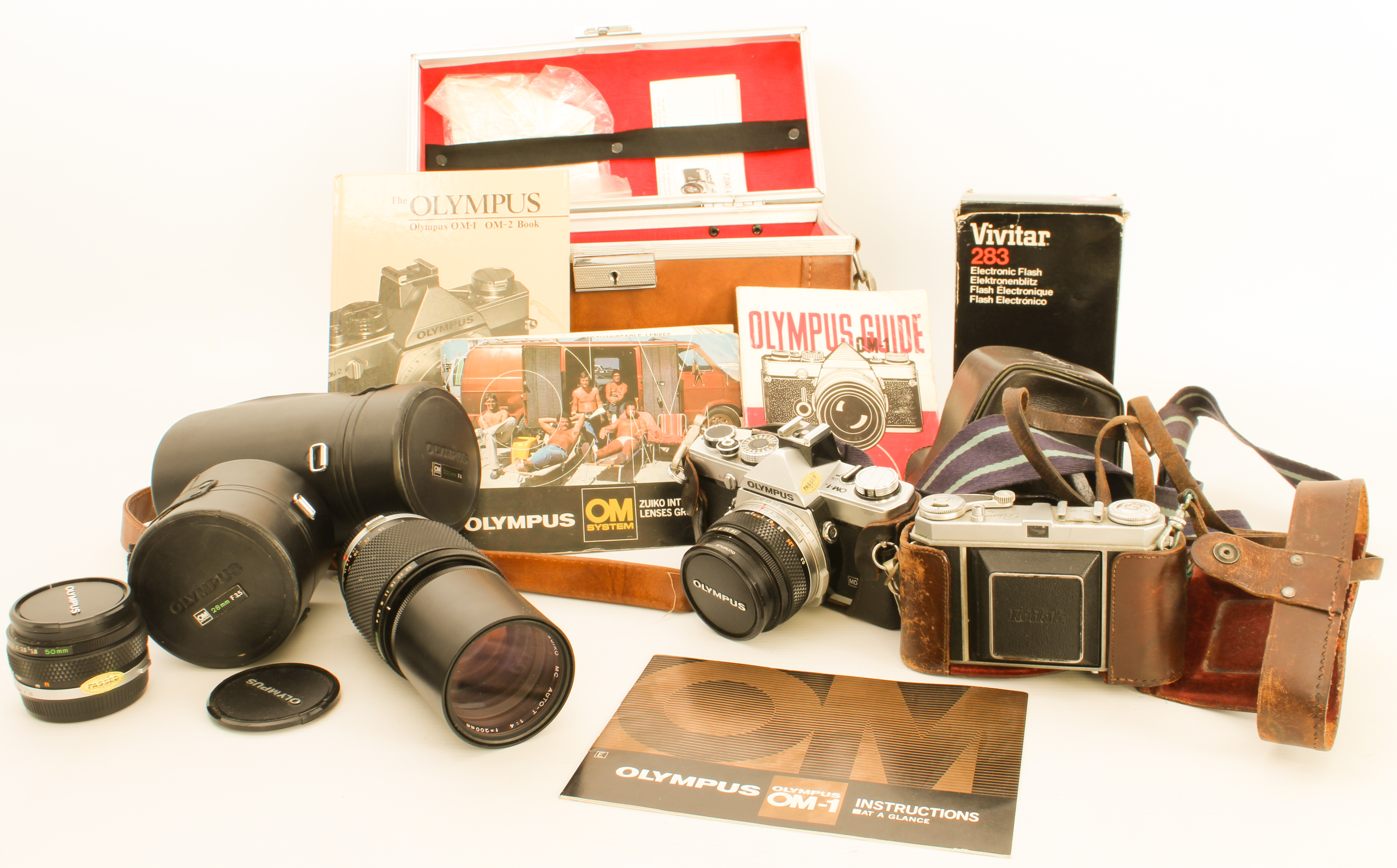 An Olympus OM-1 35mm camera, lenses and accessories - the OM-1N body with an Olympus OM-System G.