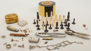 A mixed lot of miscellania to include a part chess set, jewellery, nutcrackers etc.