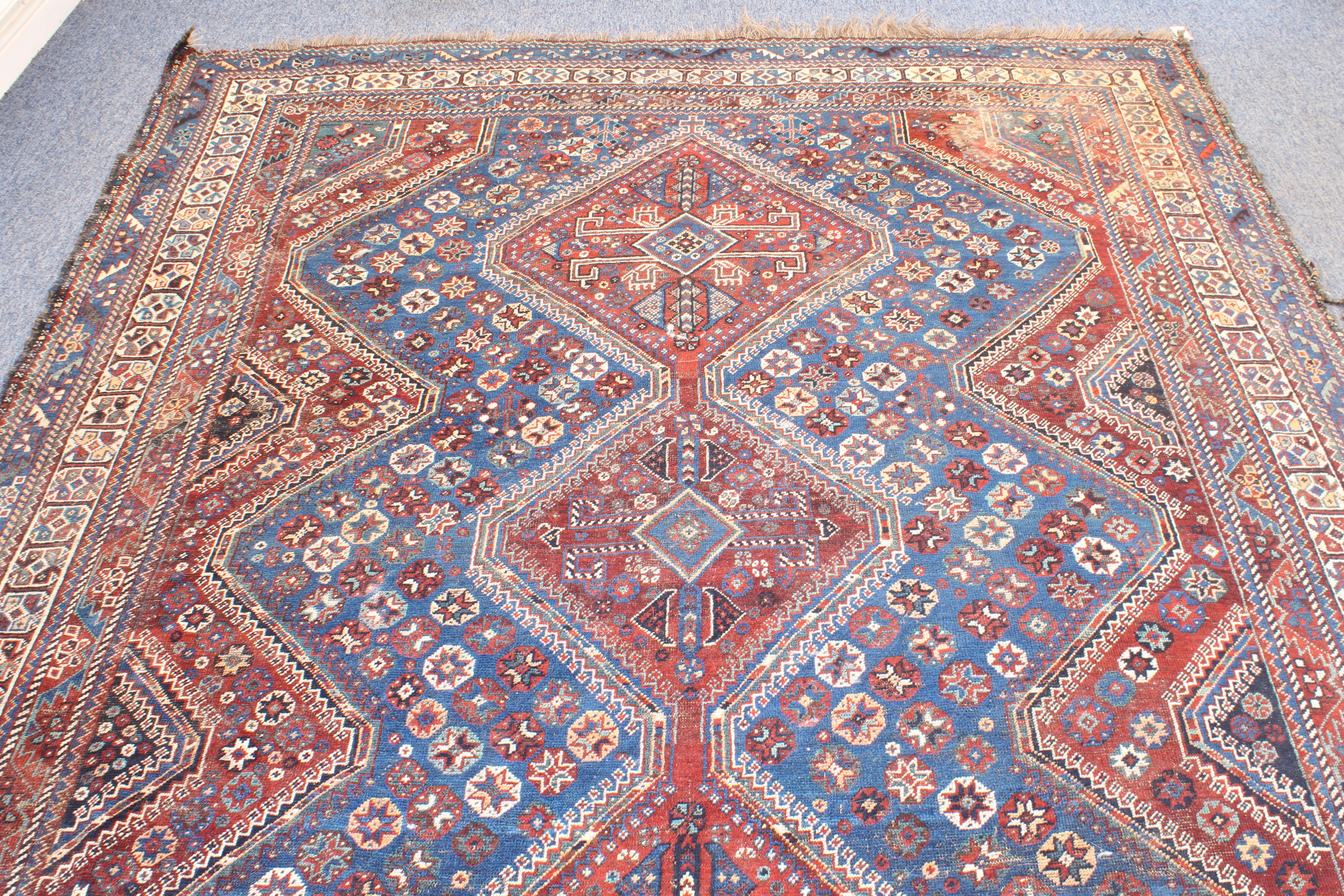 A large Persian Heriz rug - probably early 20th century, the three madder pole medallions with - Image 2 of 6