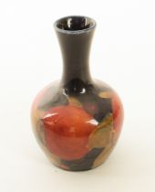 A small William Moorcroft 'Pomegranate' pattern vase - of bottle form, mid-20th century, impressed