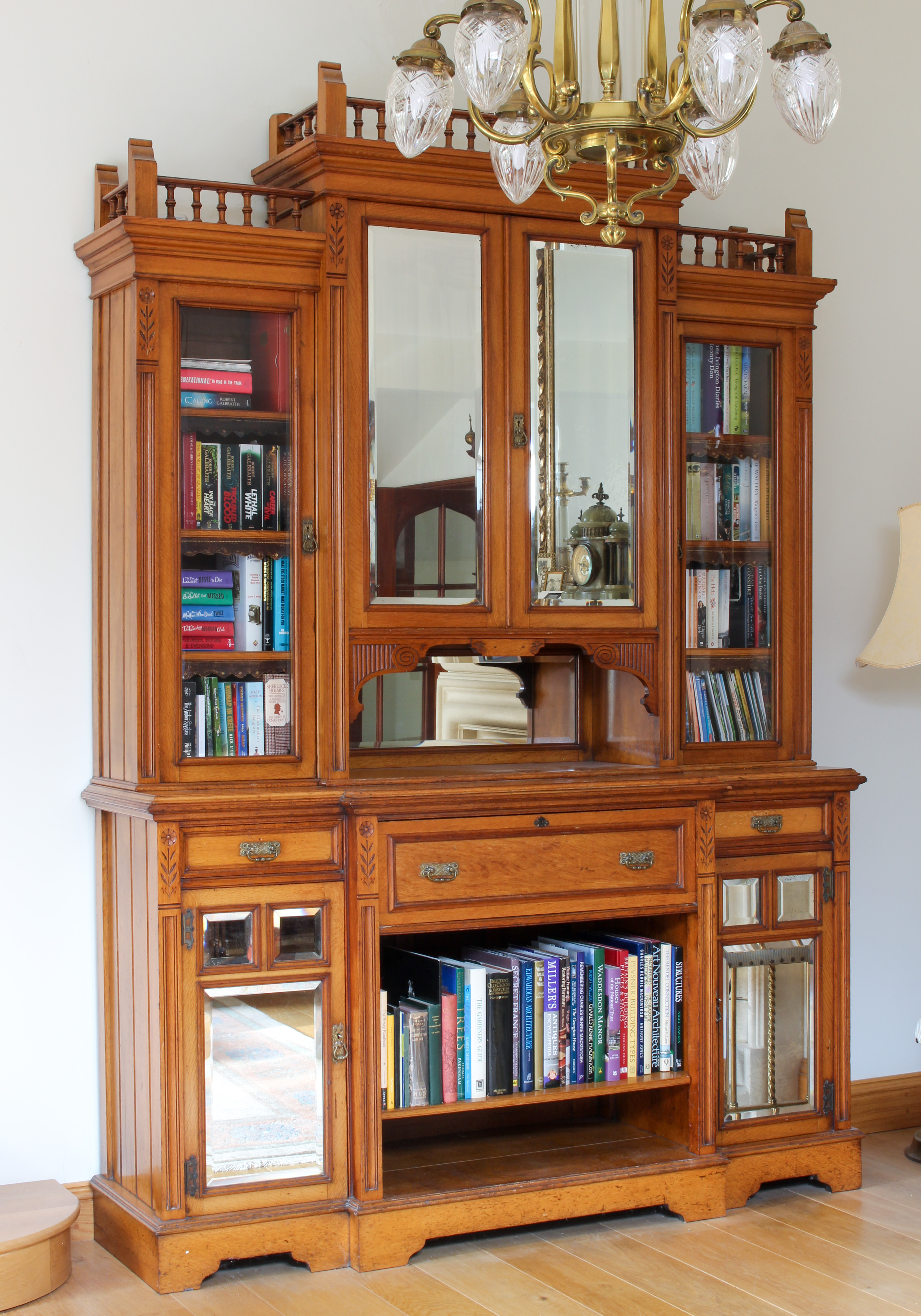 A fine quality late-Victorian Arts & Crafts style honey oak breakfront secretaire library bookcase -