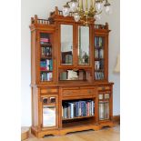 A fine quality late-Victorian Arts & Crafts style honey oak breakfront secretaire library bookcase -