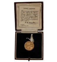 A 1907 gold sovereign in its Lloyd's of London gilt-tooled leather fitted case and complete with its