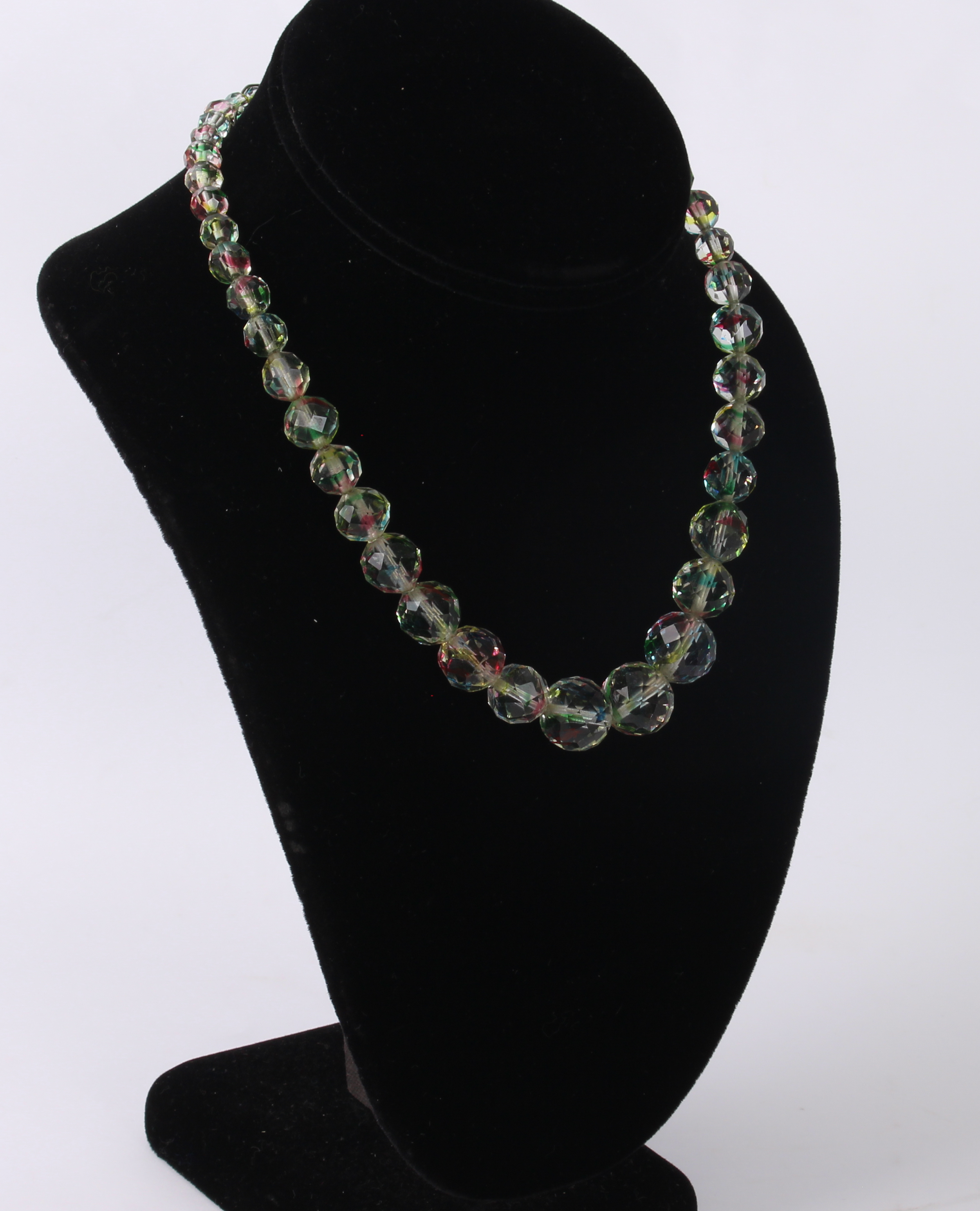 A vintage mid-century 'watermelon' bead necklace - 1930s-50s, the faceted, graduated clear glass