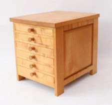 A maple wood tabletop collector's chest - late 20th century, with six drawers (three with internal