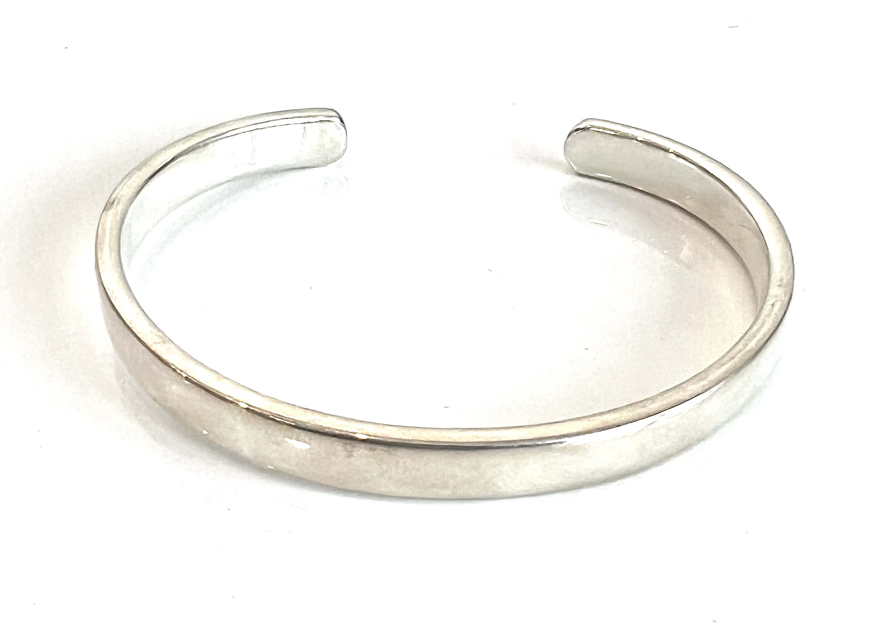 Four sterling silver bangles - each stamped 925, one Birmingham hallmarked. - Image 4 of 4