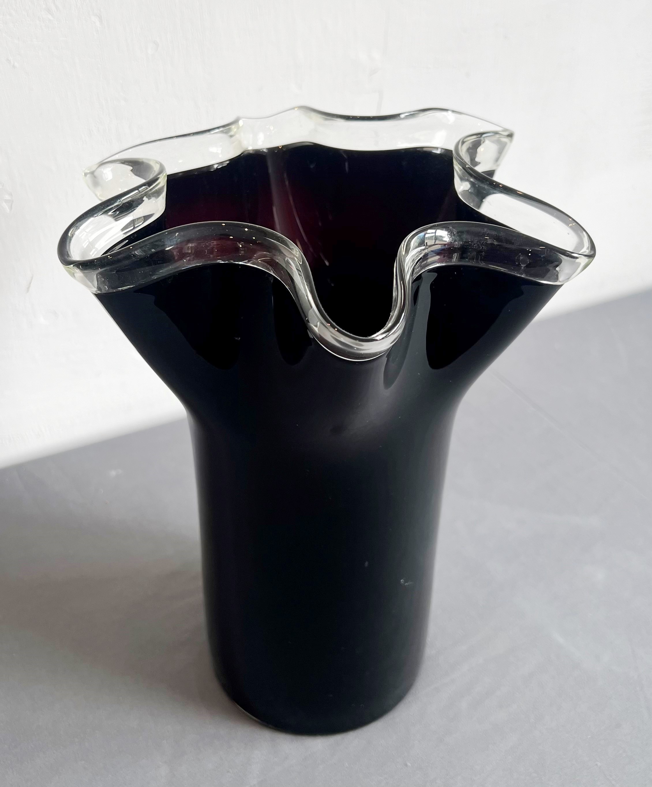 A Murano-style dark-red and clear glass handkerchief vase - the deep ruby red glass trumpet-shaped