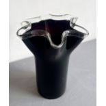 A Murano-style dark-red and clear glass handkerchief vase - the deep ruby red glass trumpet-shaped