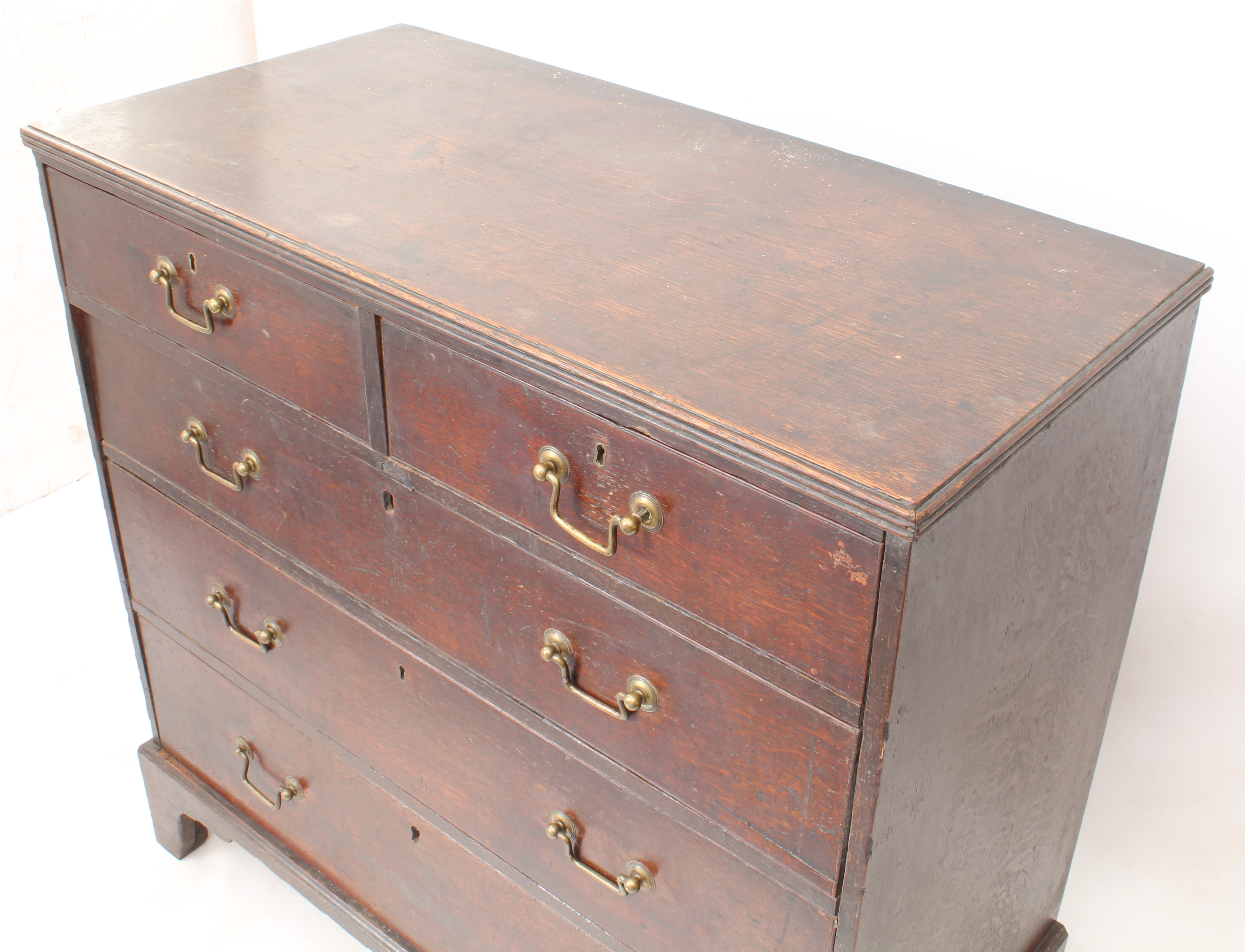 A George III oak straight-front chest of drawers - the moulded top over two short and three long - Image 3 of 3