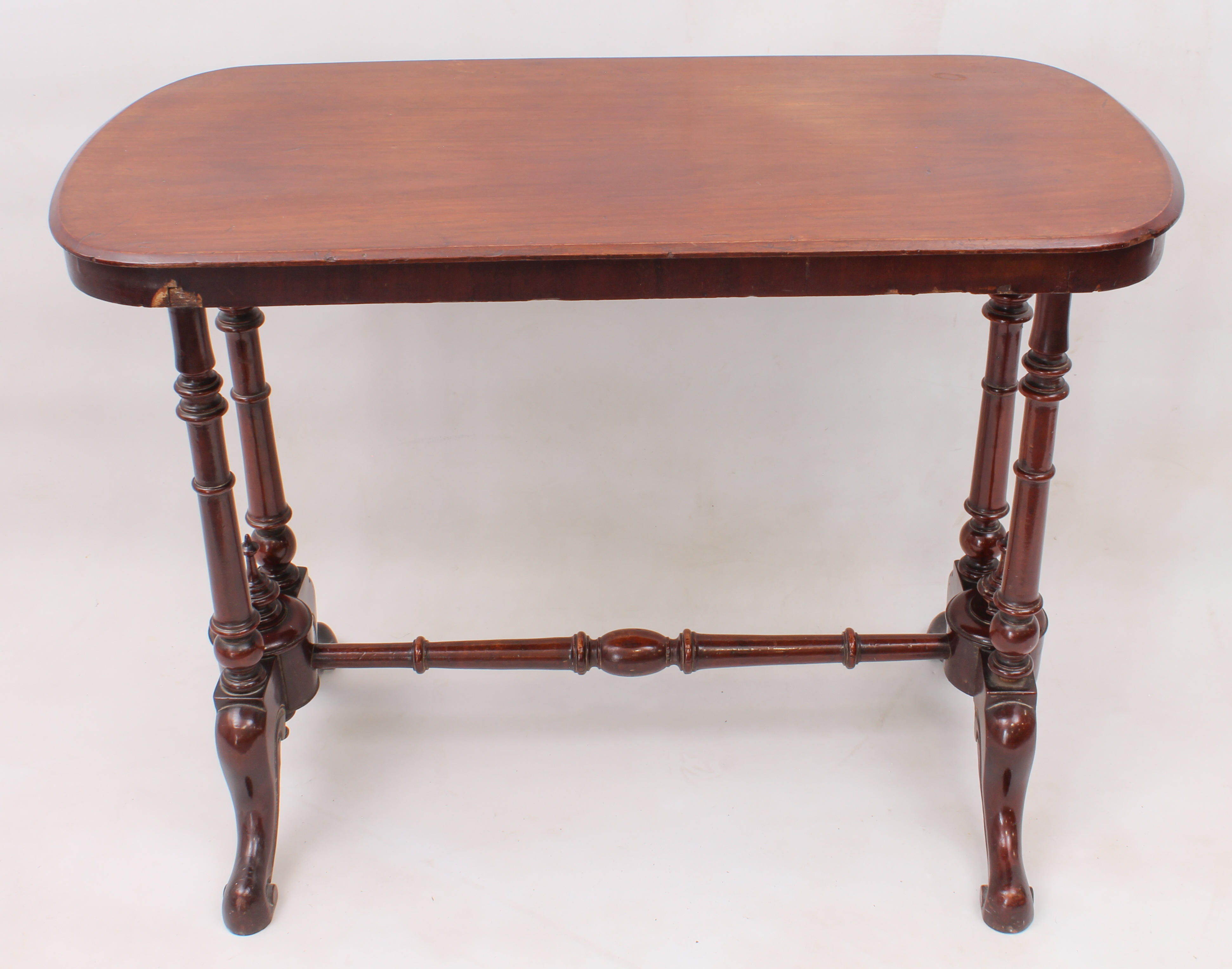 A Victorian mahogany centre table - the rounded, oblong moulded top raised on twin ring-turned - Image 2 of 2