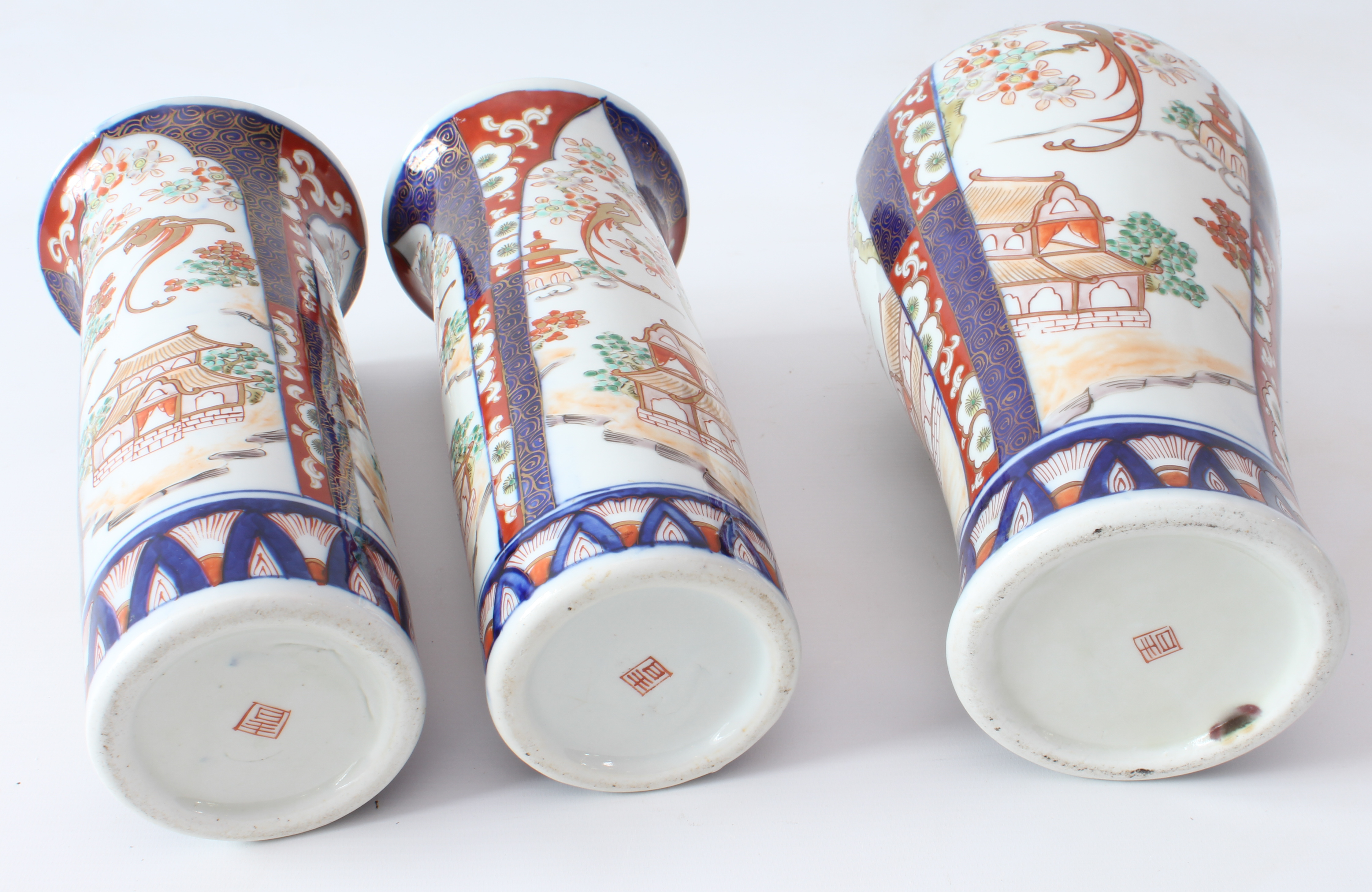 A garniture of three Japanese porcelain Imari decorated vases - early 20th century, comprising a - Image 3 of 4