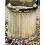 A pair of fluted column style planter bases or pedestals - (minor surface chip to both), 35cm