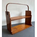 An early 20th century satinwood and bentwood portable bookshelf - the two waterfall shelves on