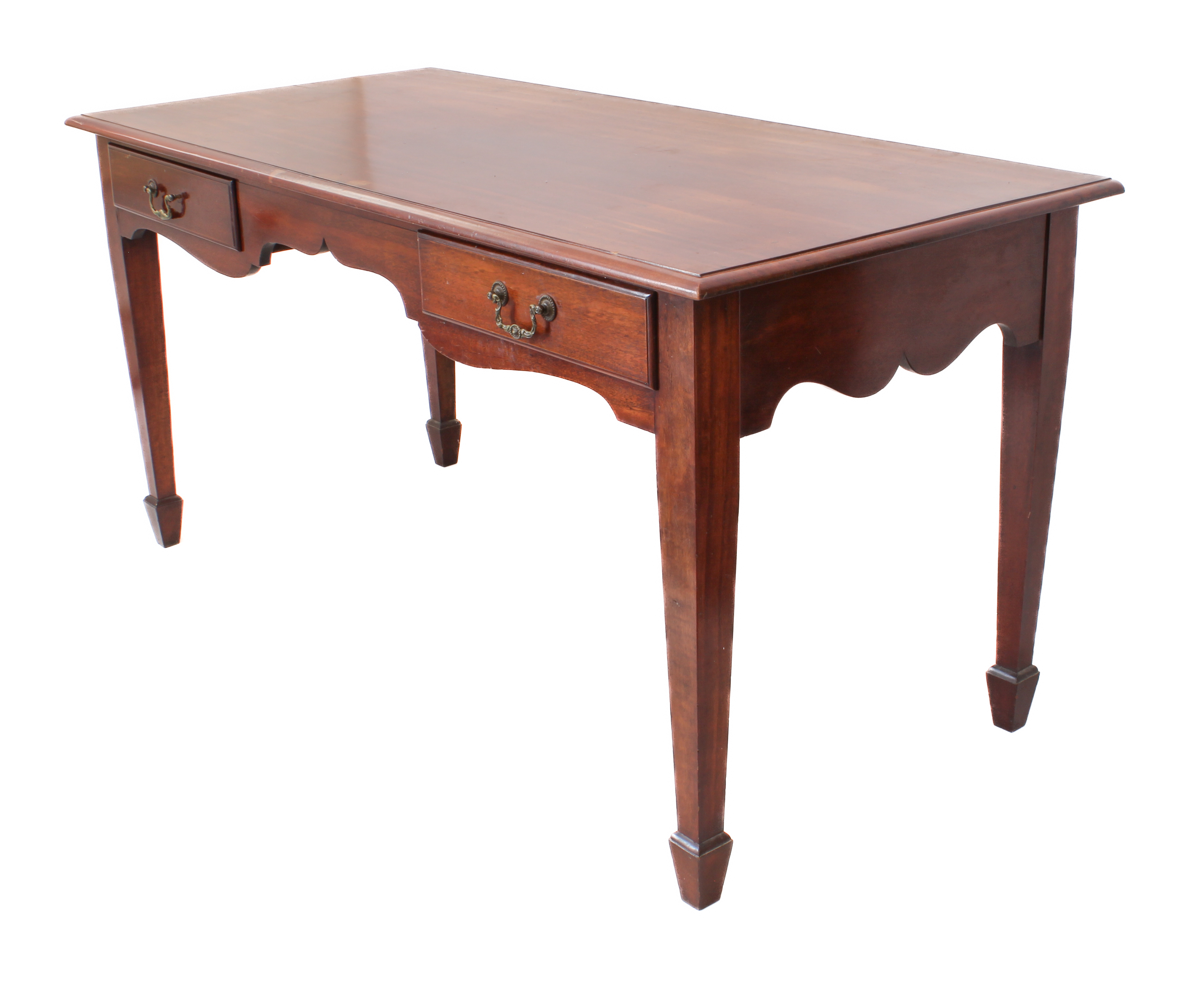 An Edwardian mahogany two-drawer library or writing table - the moulded top over two frieze