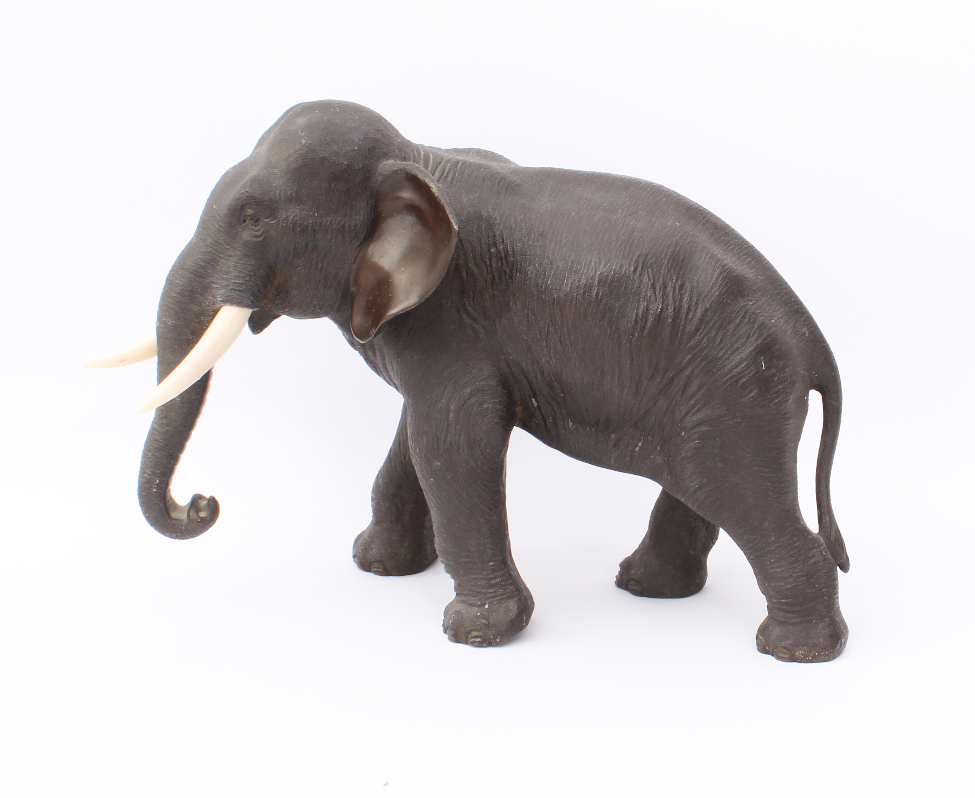 A Japanese bronze figure of an elephant - Meiji period (1868-1912), signed with four-character