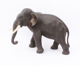 A Japanese bronze figure of an elephant - Meiji period (1868-1912), signed with four-character