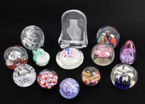 A collection of thirteen glass paperweights - late 20th century, including a Caithness 'Mooncrystal'