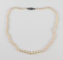 A vintage mid-century graduated cultured pearl necklace - 1920s-30s, single strand, the pearls