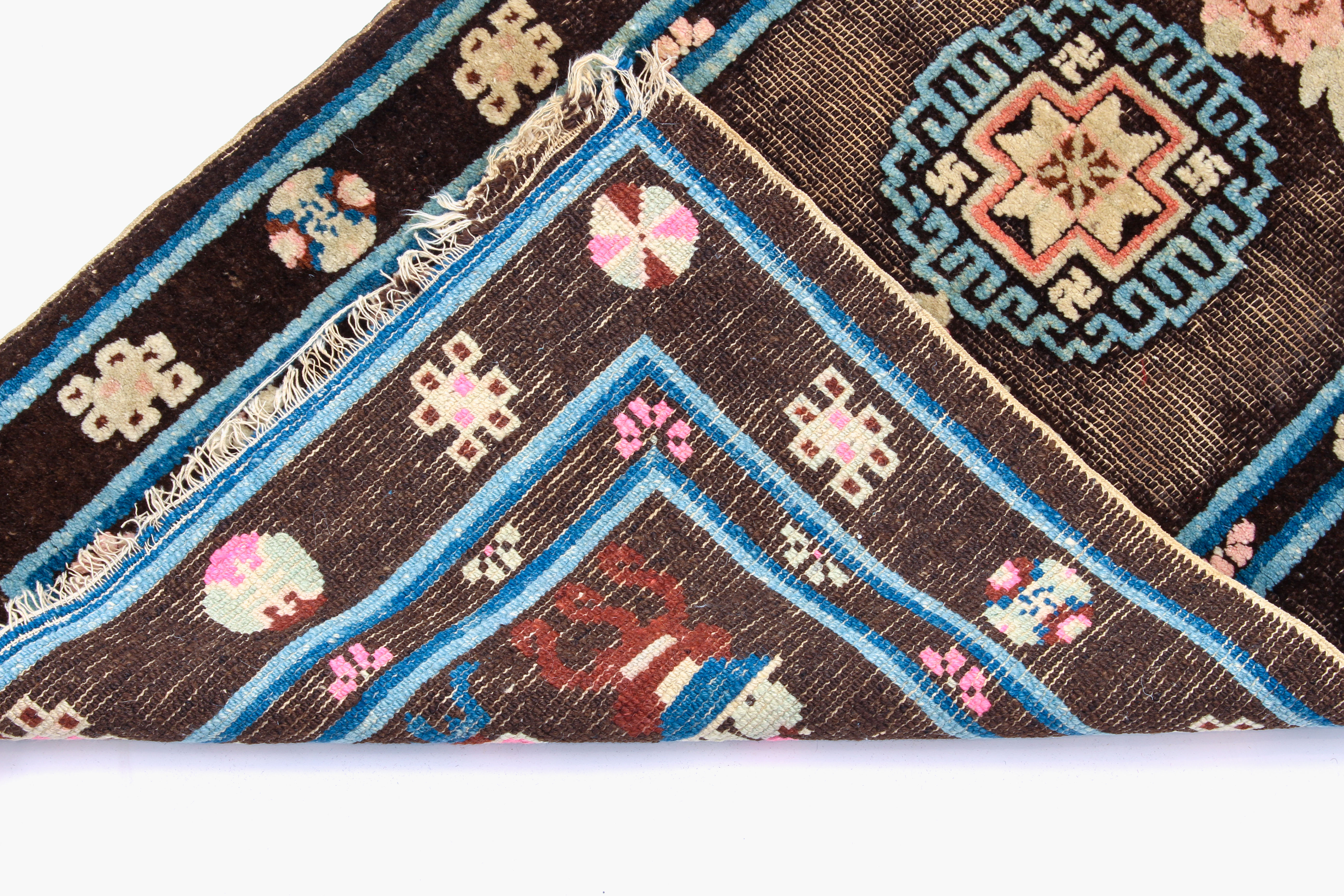 A 1920s-30s Chinese wool rug - decorated with vases and precious objects on a Royal blue ground, - Image 5 of 5
