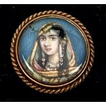 An Indian School portrait miniature of a young lady - probably late 19th / early 20th century, oil