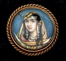 An Indian School portrait miniature of a young lady - probably late 19th / early 20th century, oil