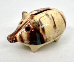 A slipware glazed pig money bank - late 19th / early 20th century, 10 cm long,