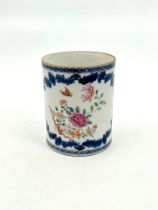 A Chinese famille rose export porcelain tankard - 19th century, with C-scroll handle, painted with a