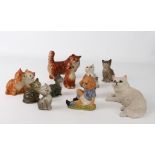 A group of eleven Beswick figures of Cats and Kittens - including an 1898 Persian Cat, ginger