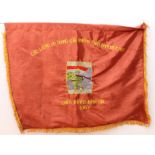 A Vietnam War Viet Cong silk victory flag - embroidered with an image of a soldier to the centre,