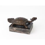 A bronze model of a mythical Chinese turtle mounted as paperweight (15 x 8 cm).