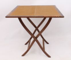 An Edwardian mahogany folding whist table - the square, centre hinged top with (faded) green