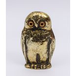 A novelty Owl match holder - with glass eyes, 10 cm high.