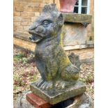 A composite stone garden water feature statue in the form of a mythical lion - 43cm high.