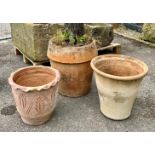 Three terracotta plant pots;  43 cm diameter x 47cm H 41 cm diameter x 39 cm H 37 cm diameter x 33