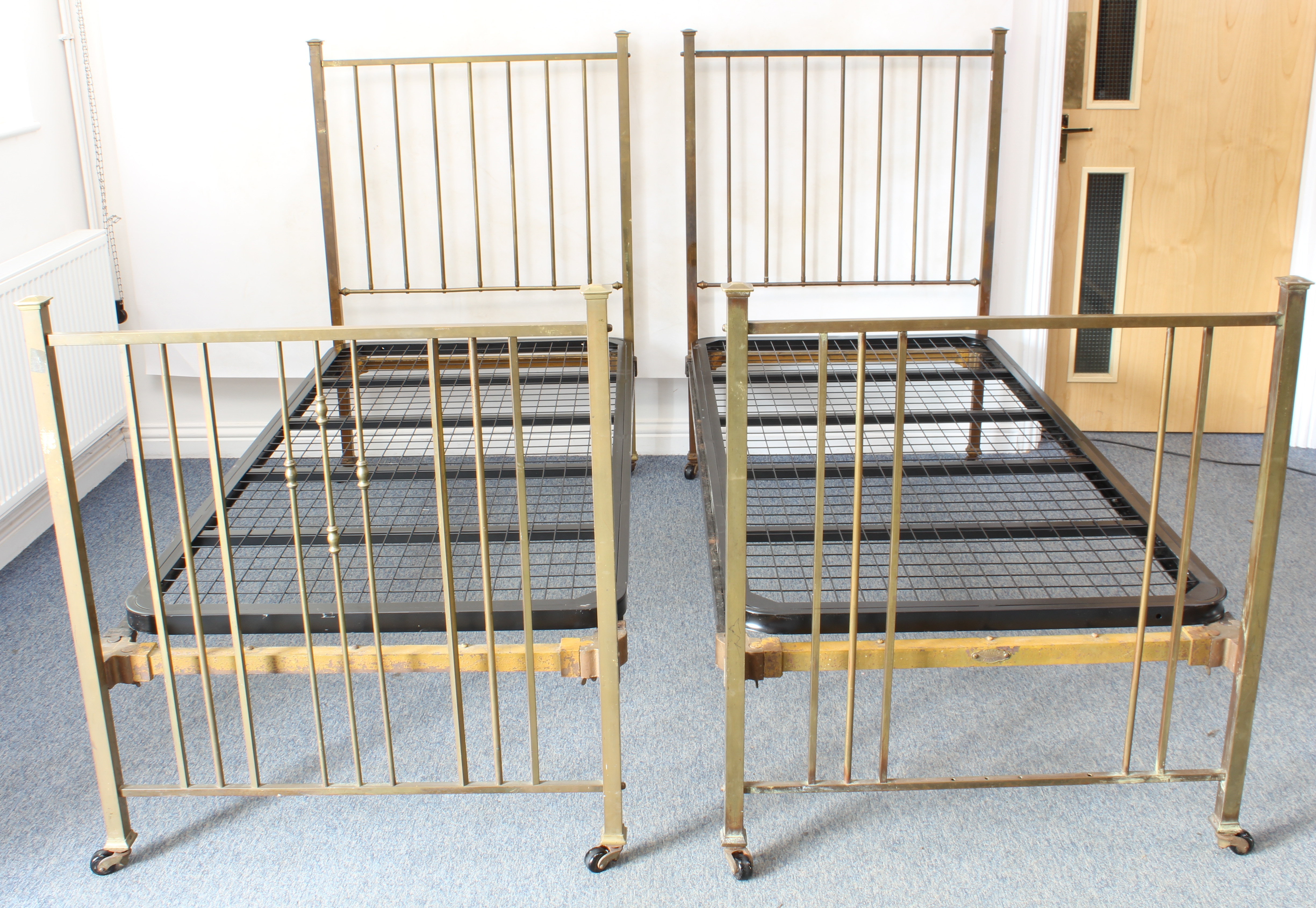 A pair of brass single beds by Heal & Sons (Heals) - 1920s-30s, the head and foot boards with square - Image 2 of 7