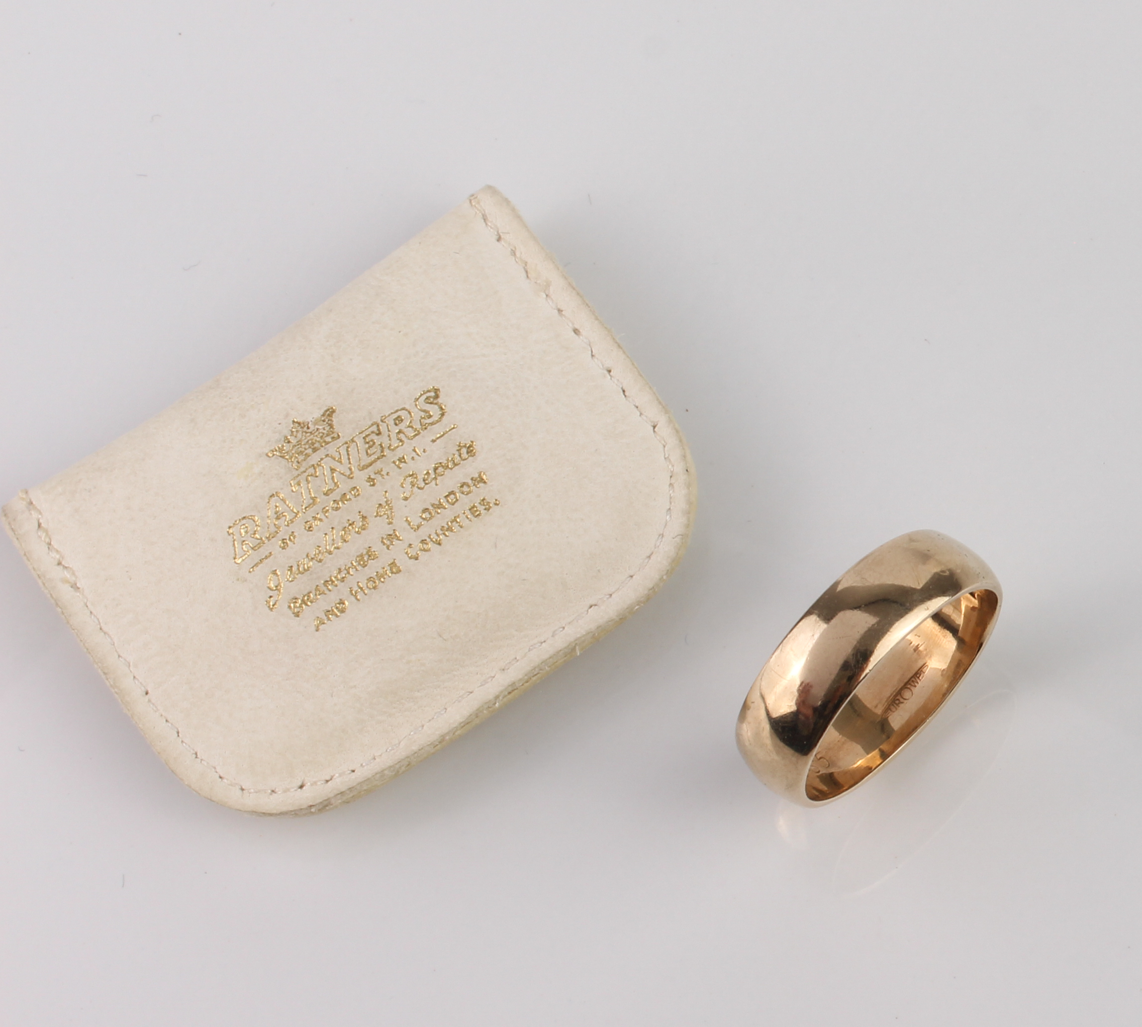 A 9ct gold wedding band - hallmarked London 1965, size W.