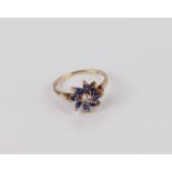 A vintage 9ct yellow gold, blue and white sapphire floral cluster ring - hallmarked London 1970, the