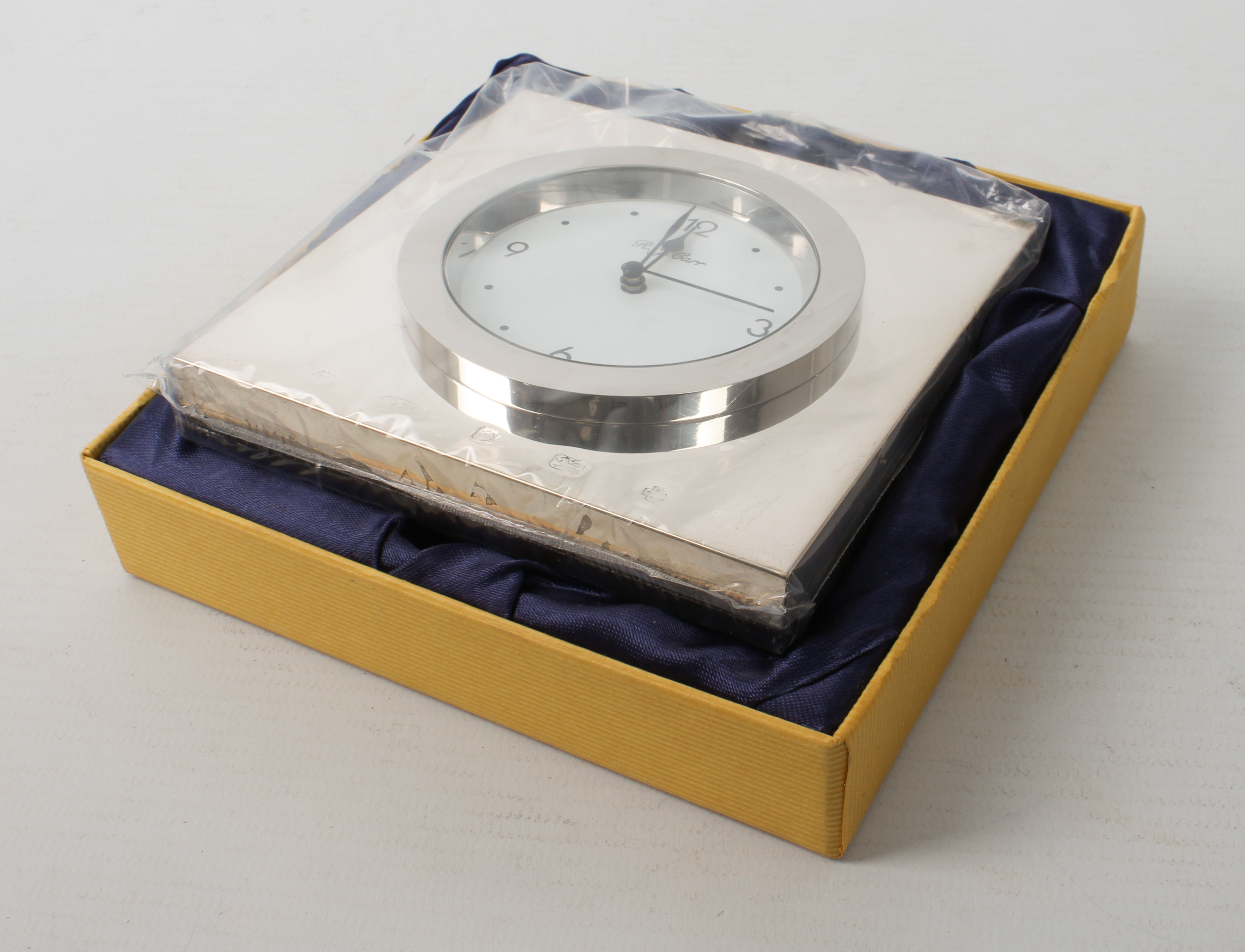 An Elizabeth II silver-cased desk clock - Carrs of Sheffield, 2000, of plain, square form with