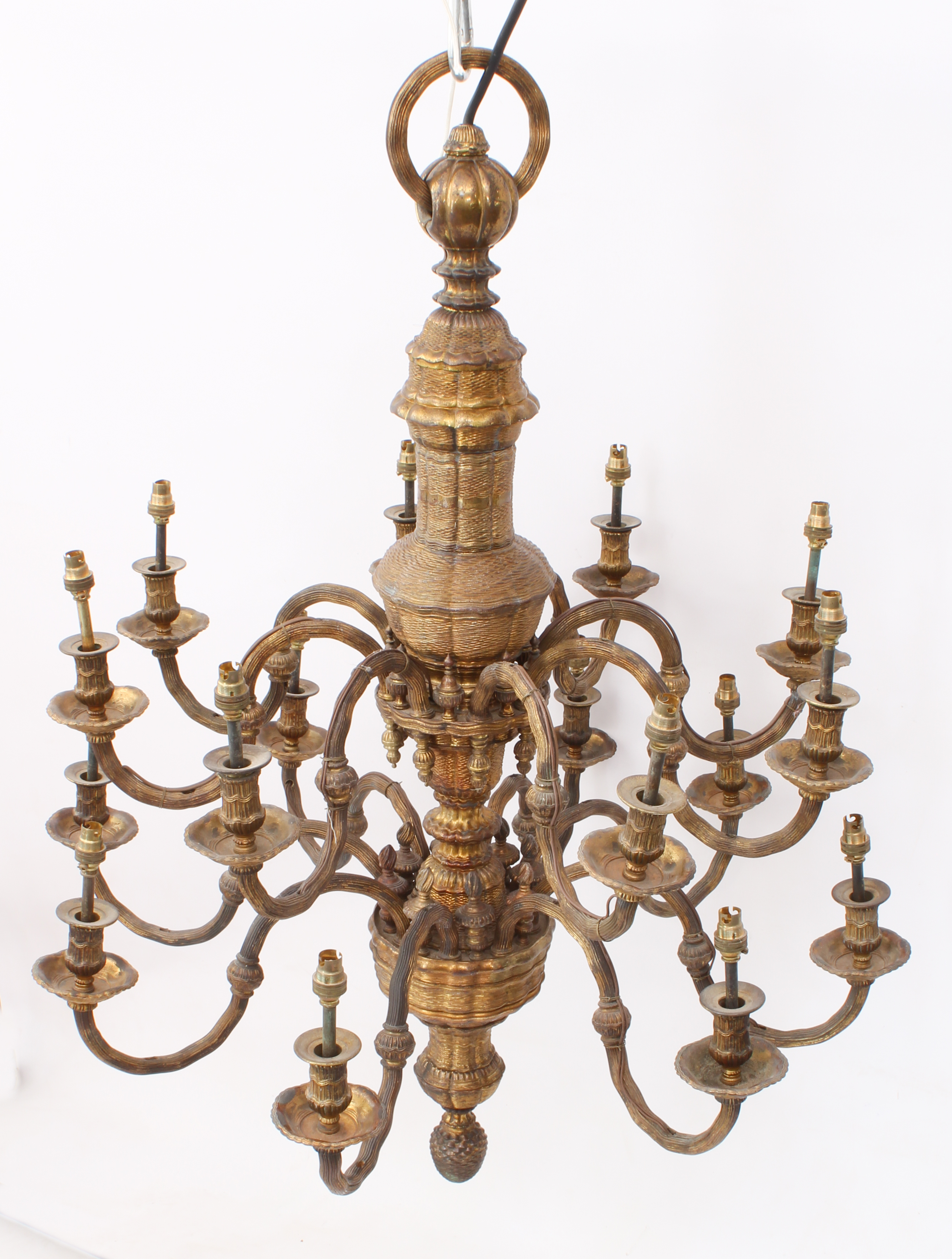 An impressive early 20th century sixteen-light gilt two-tier brass chandelier - the sixteen