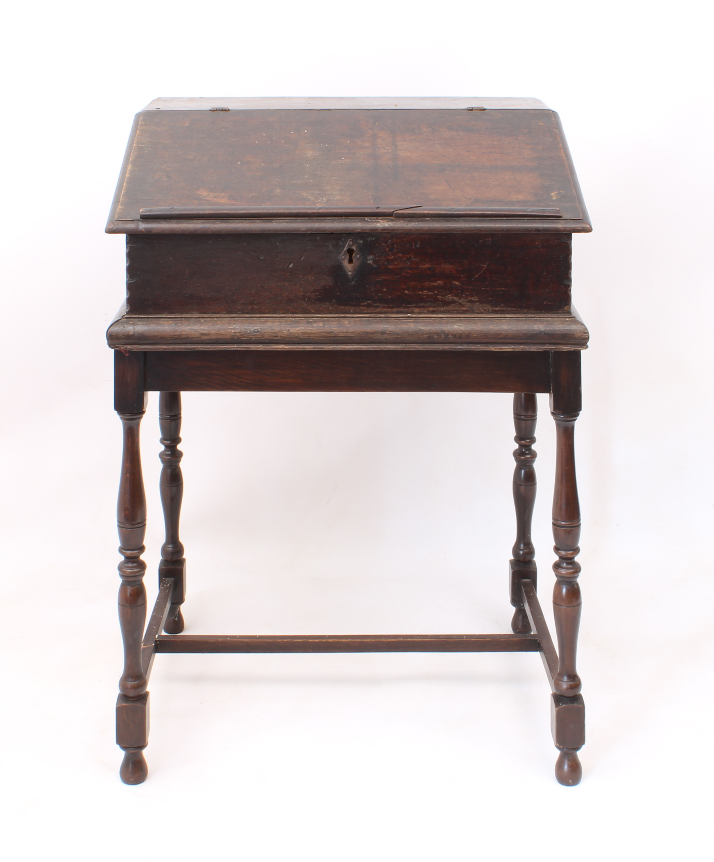 A late-18th century oak clerk's desk - the hinged lid with book-rest, enclosing a simply fitted - Image 3 of 4