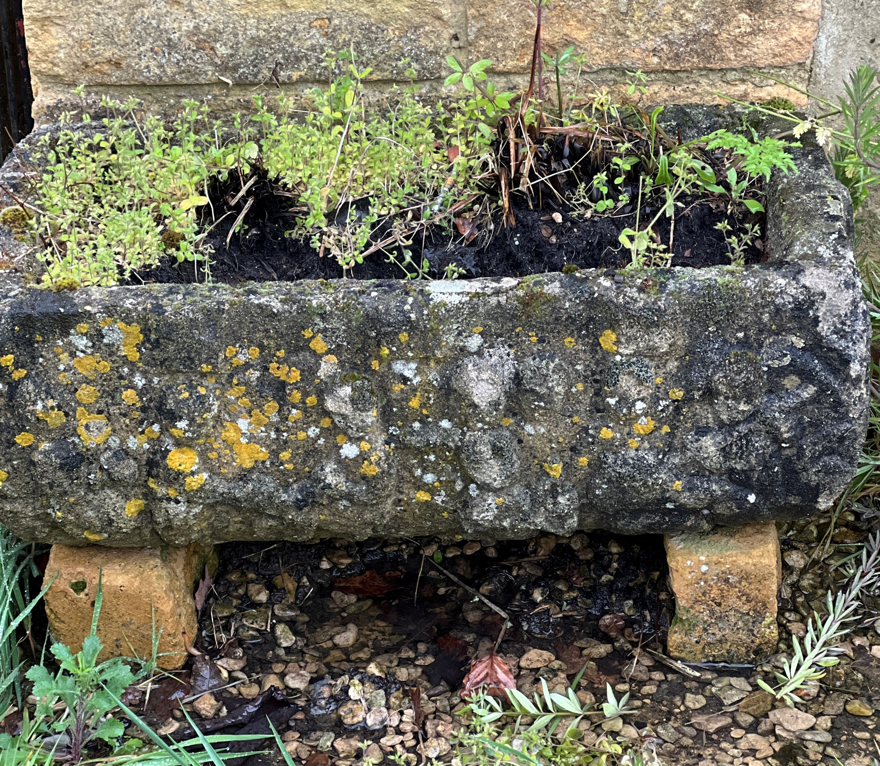 A composite stone rectangular trough-style planter - 69 x 39cm, 23cm high.