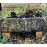 A composite stone rectangular trough-style planter - 69 x 39cm, 23cm high.