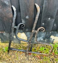 A pair of cast iron sink supports - 77cm x 37cm.