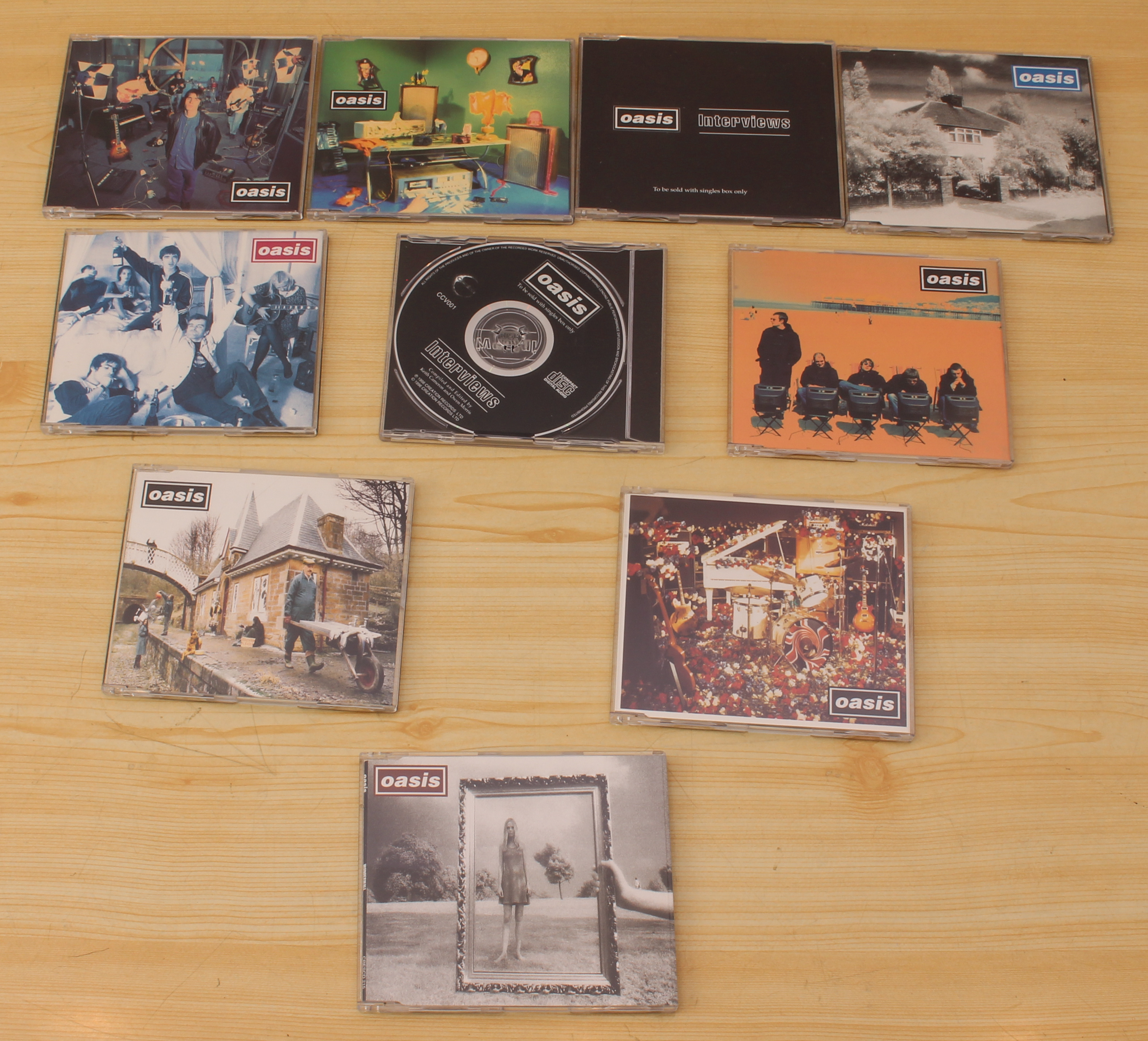 Two Oasis CD singles box sets to include: Definitely Maybe (5 CD singles box set with booklet - Image 3 of 4